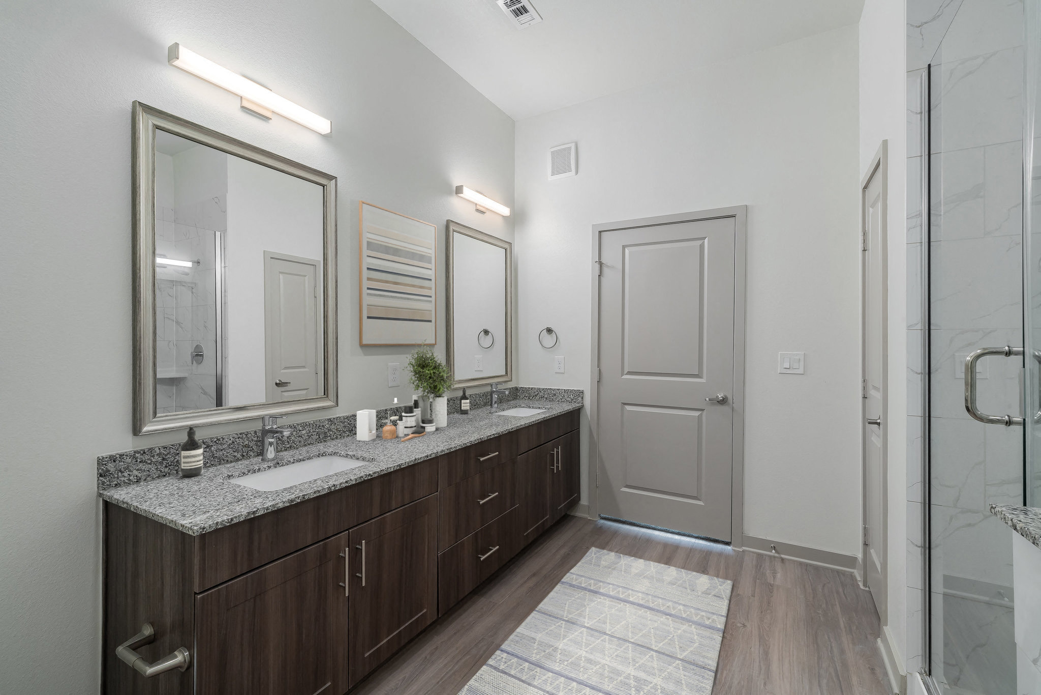 Bathroom with double-vanity and walk-in shower